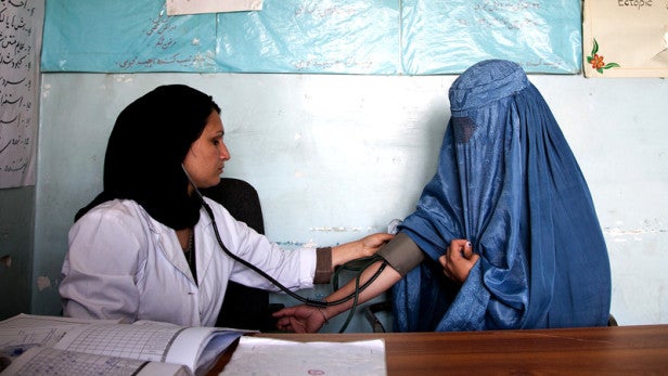 Woman gets check up at health clinic in Afghanistan
